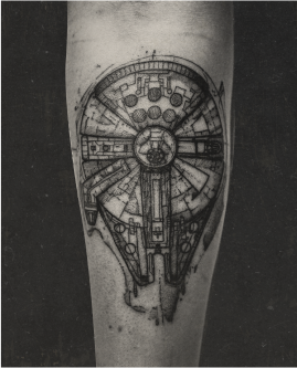 Detailed black and grey Starwars tattoo of the millennium falcon by Jay C Tattoo, Brighton tattoo artist, UK