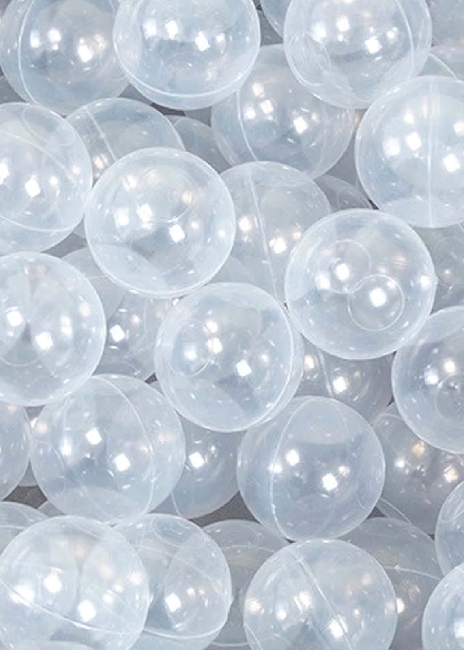 A collection of transparent ball pit balls.
