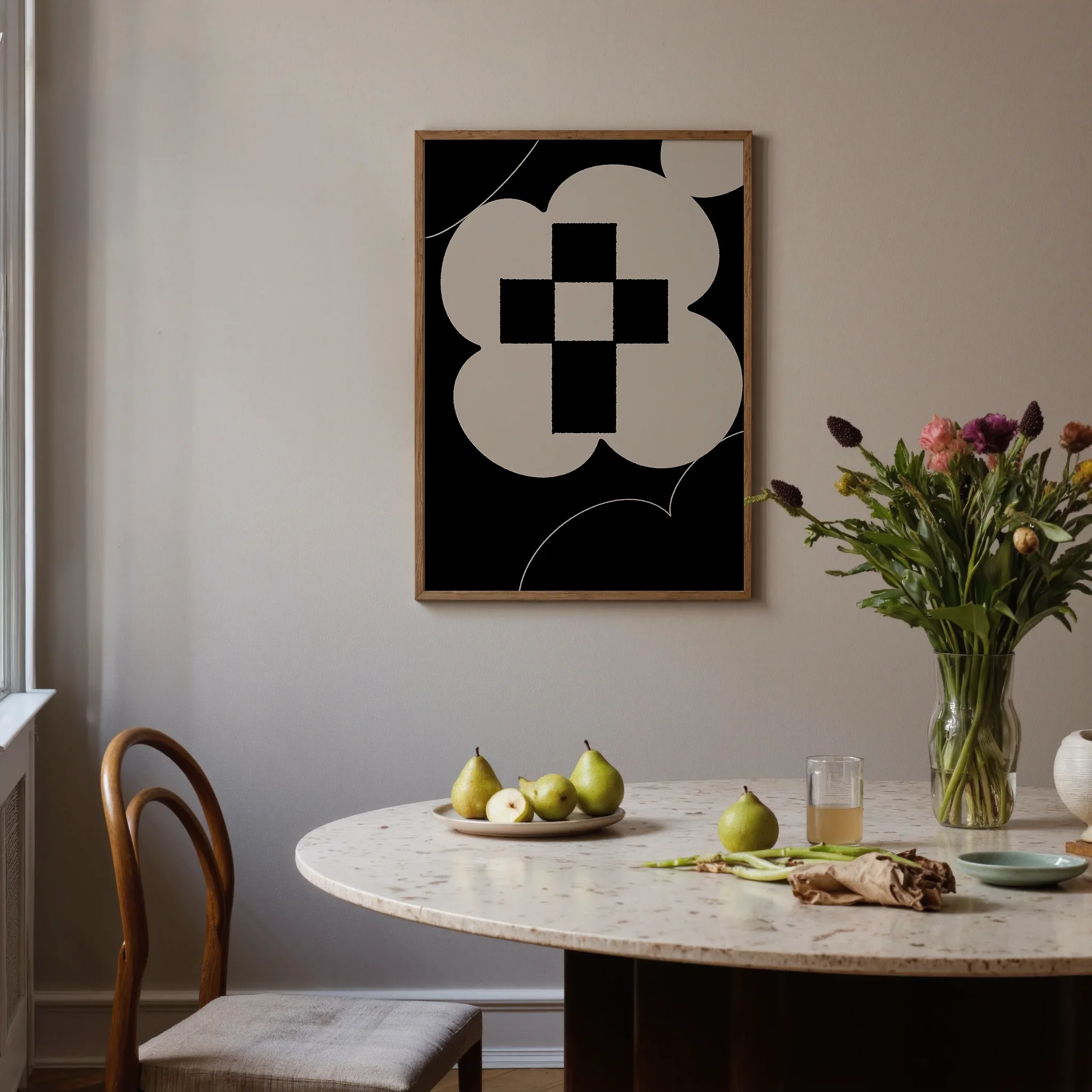 A Christian wall art print featuring cross art poster gentle floral design, shown near a window above a round table with flowers.