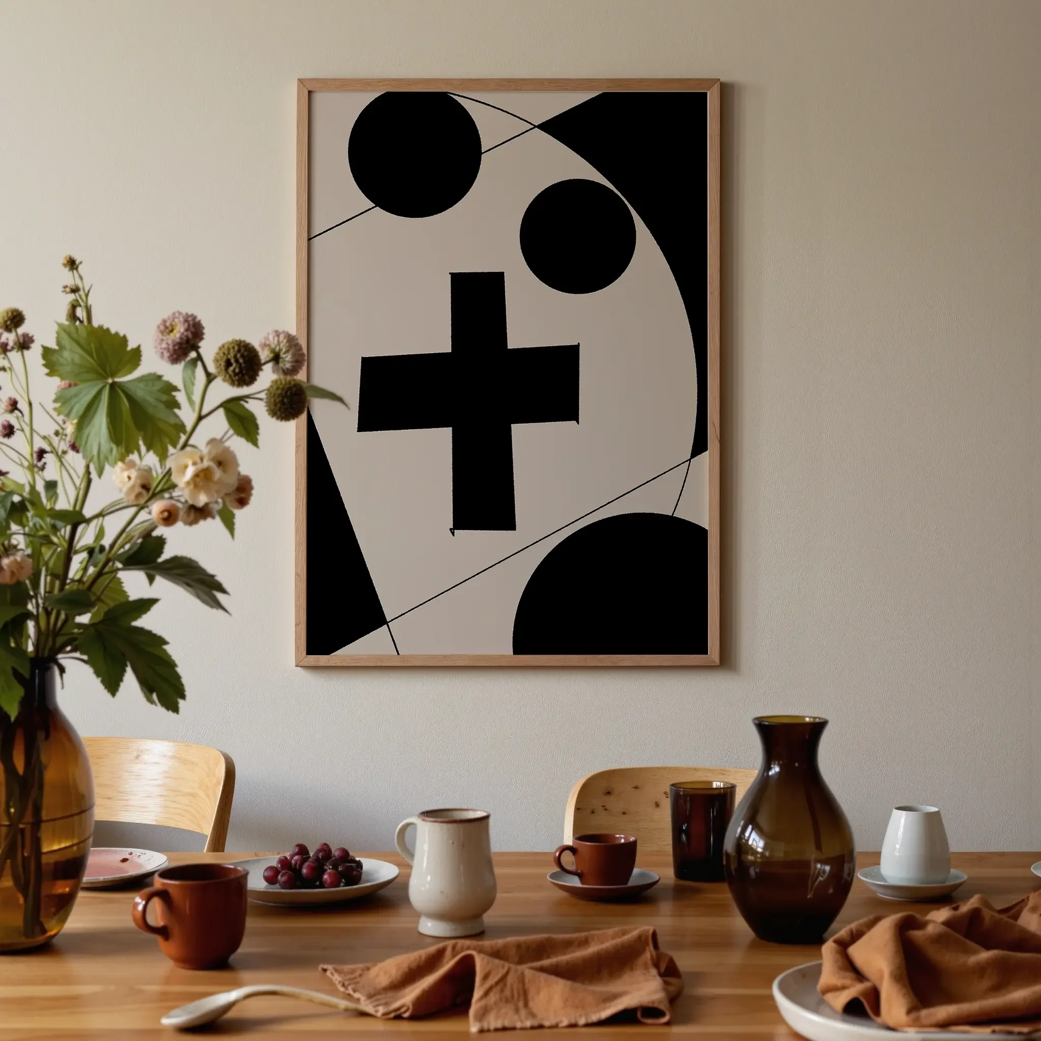 A Christian wall art print featuring cross art poster geometric minimalist design, displayed in a dining room with warm tones and a styled table setting.