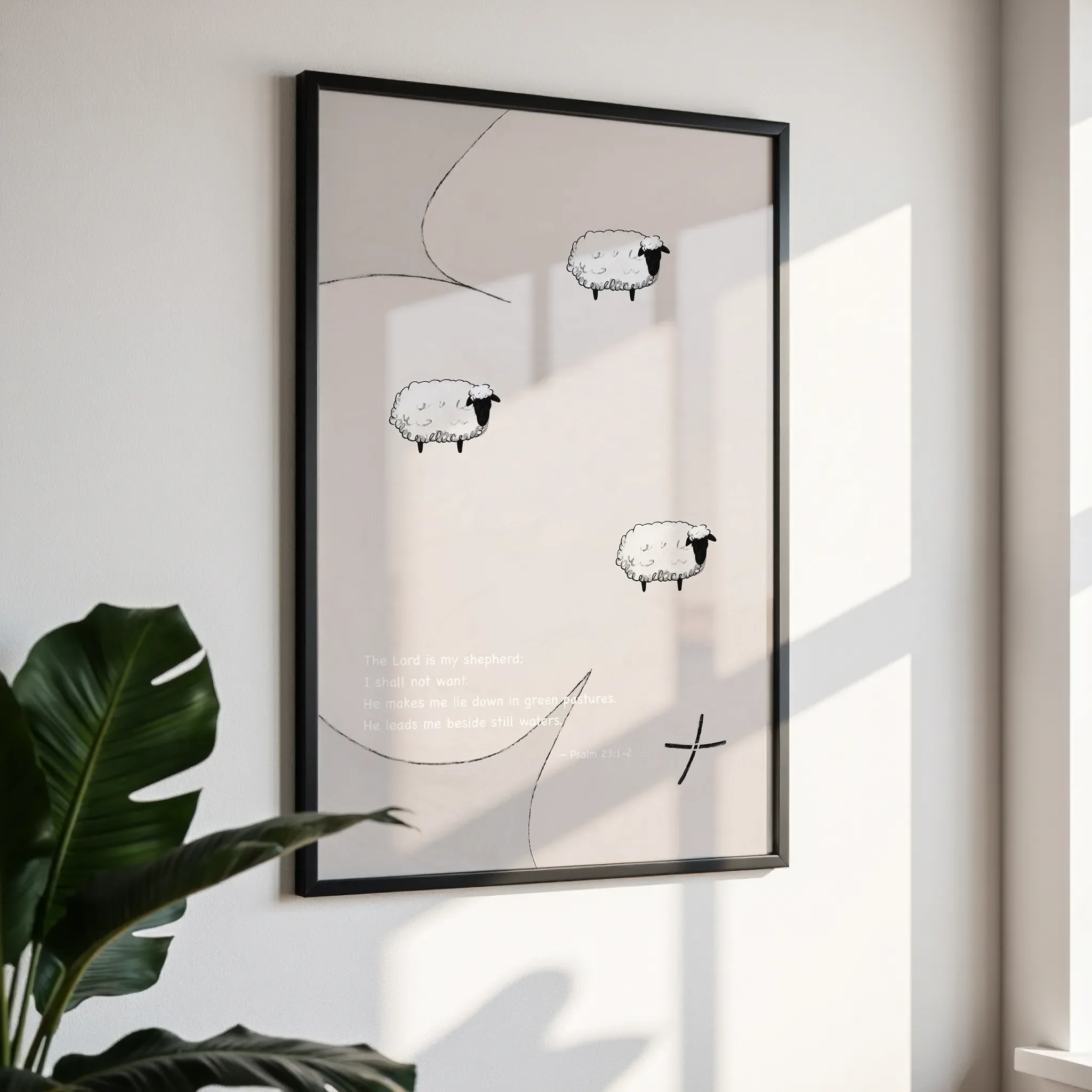 Framed wall art in a simple black frame, photographed from an angled view against a white wall with direct sunlight.