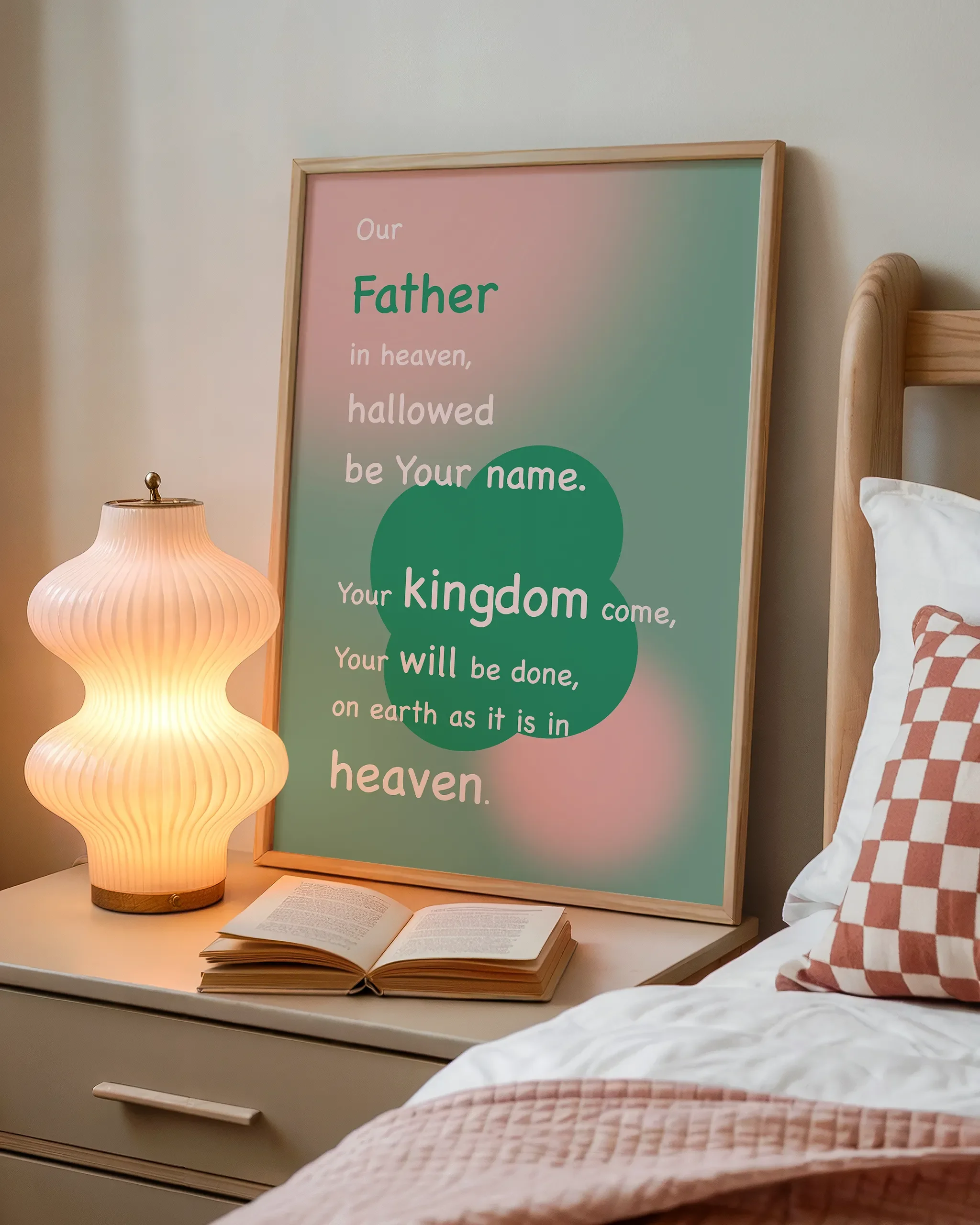 Displayed beside a wooden bed with a book and a softly glowing bedside lamp, creating a cozy atmosphere.