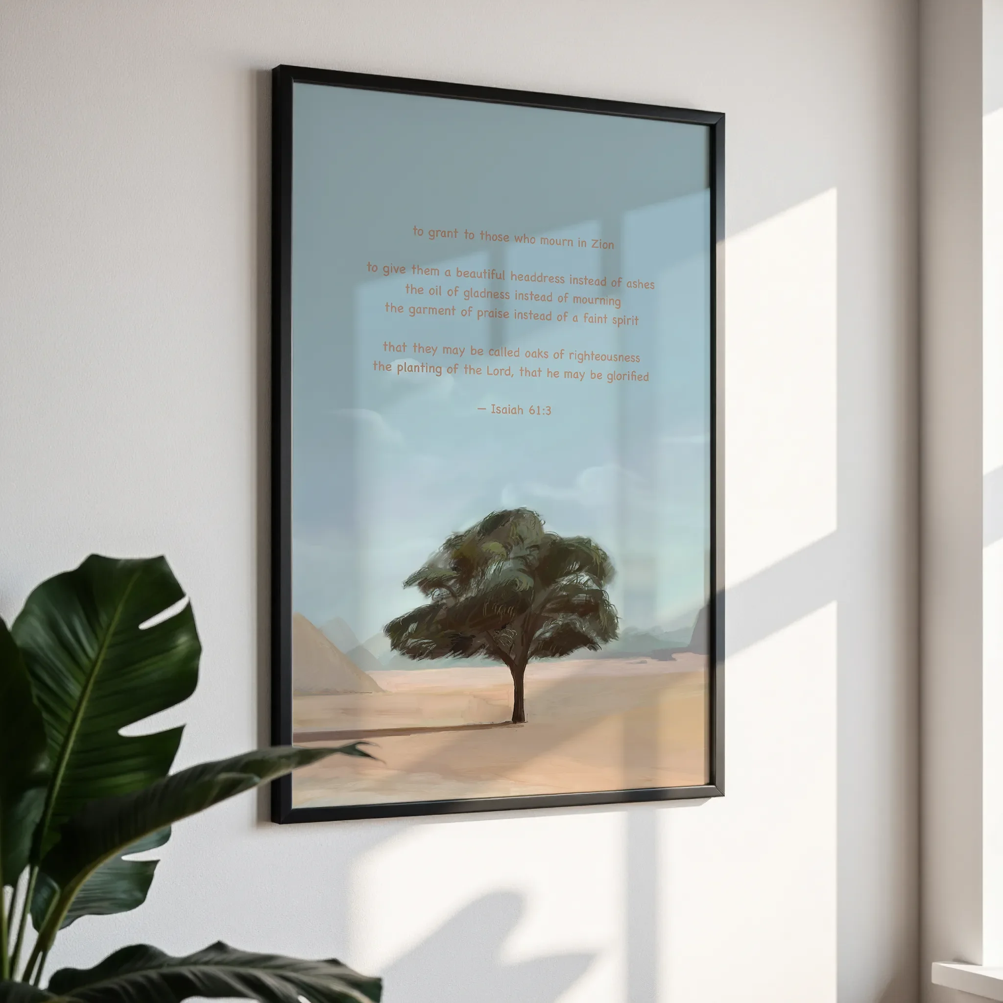 Framed wall art in a simple black frame, photographed from an angled view against a white wall with direct sunlight.