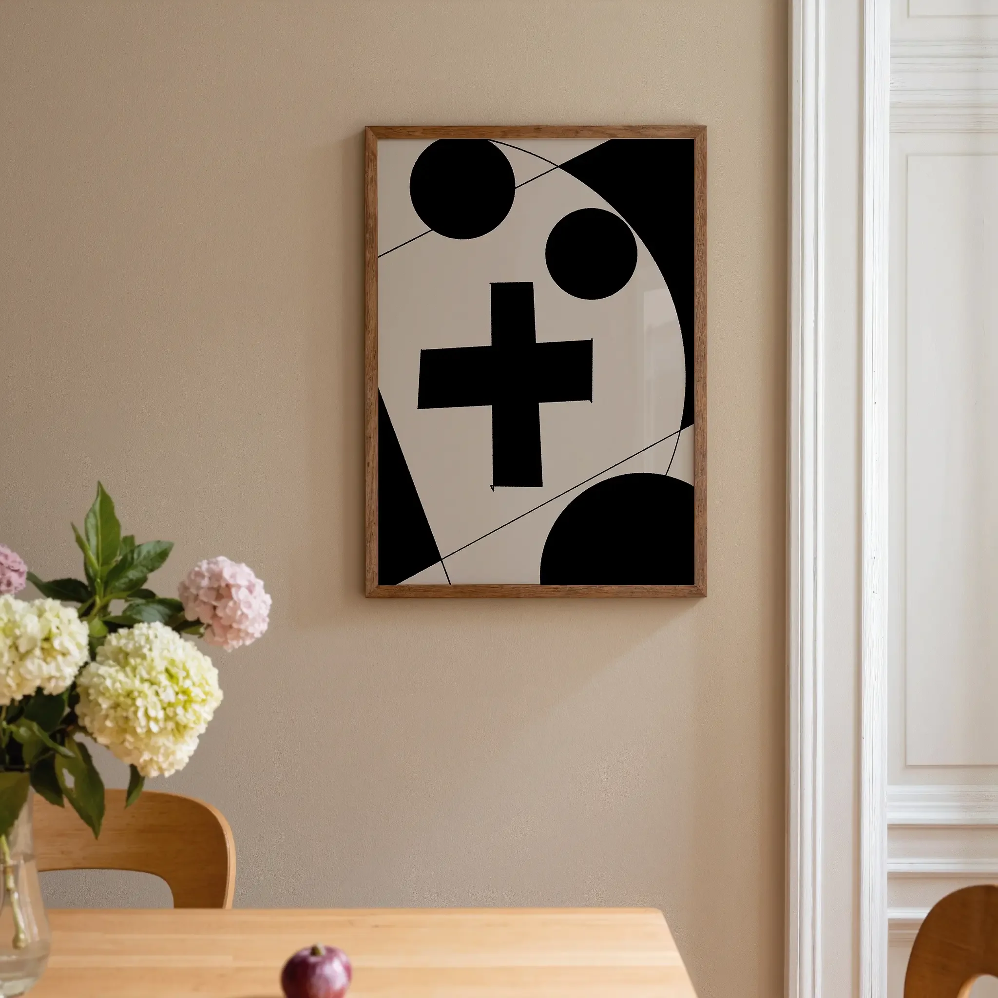 A Christian wall art print featuring cross art poster geometric minimalist design, shown in a cozy home interior with warm tones and floral accents.