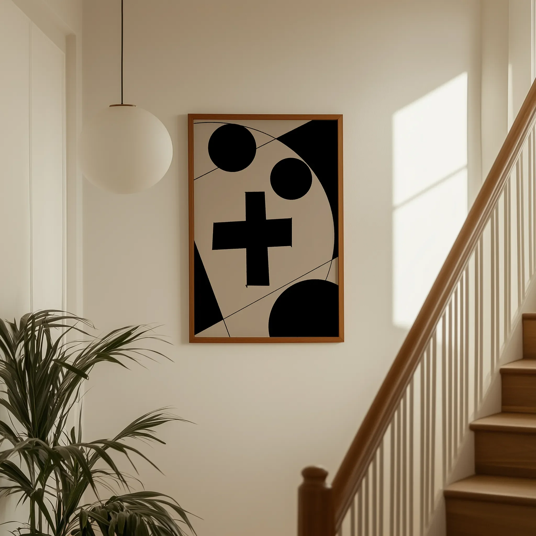 Displayed on a hallway wall near a staircase with directional natural light.