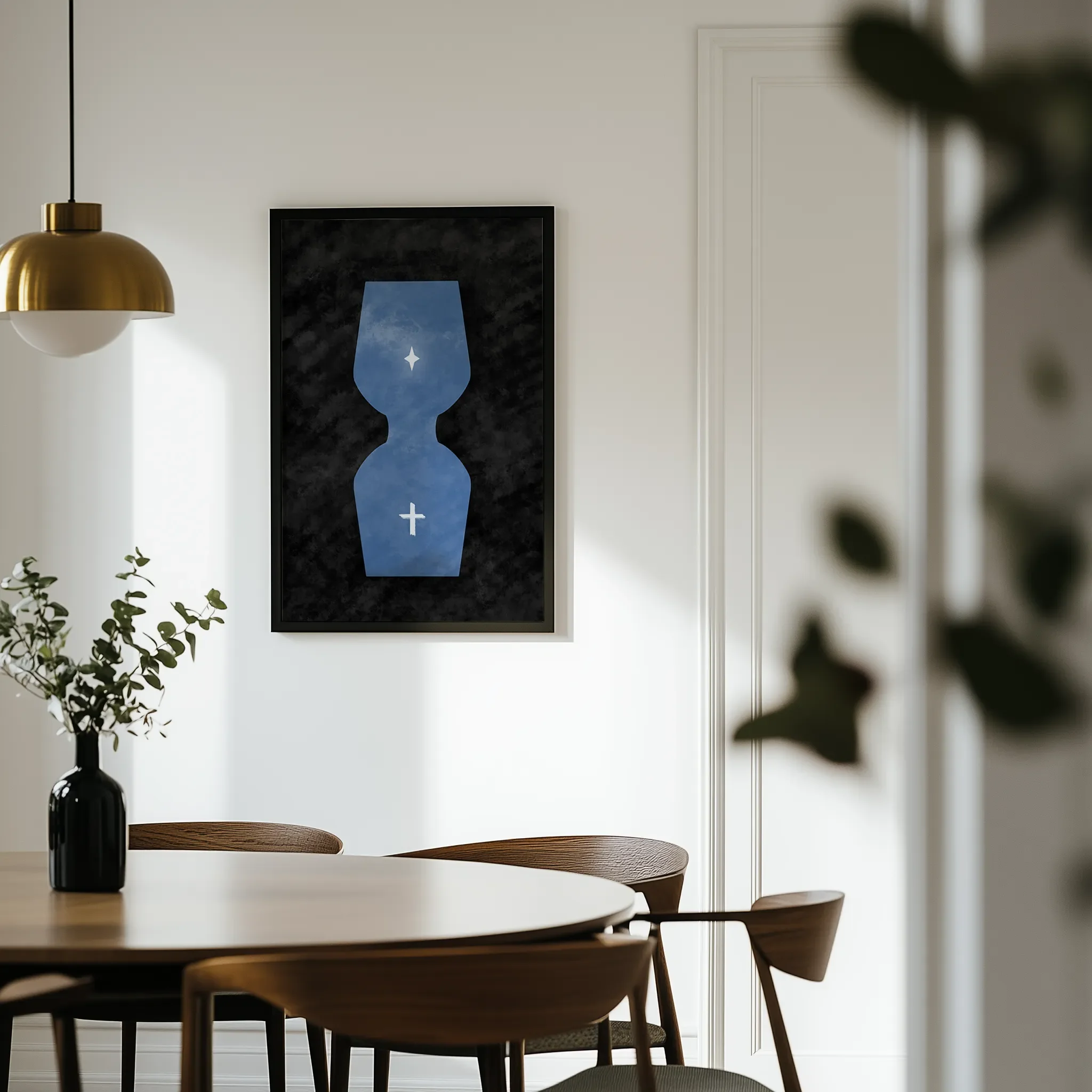 Displayed in a light dining room with a wooden round table and chairs.