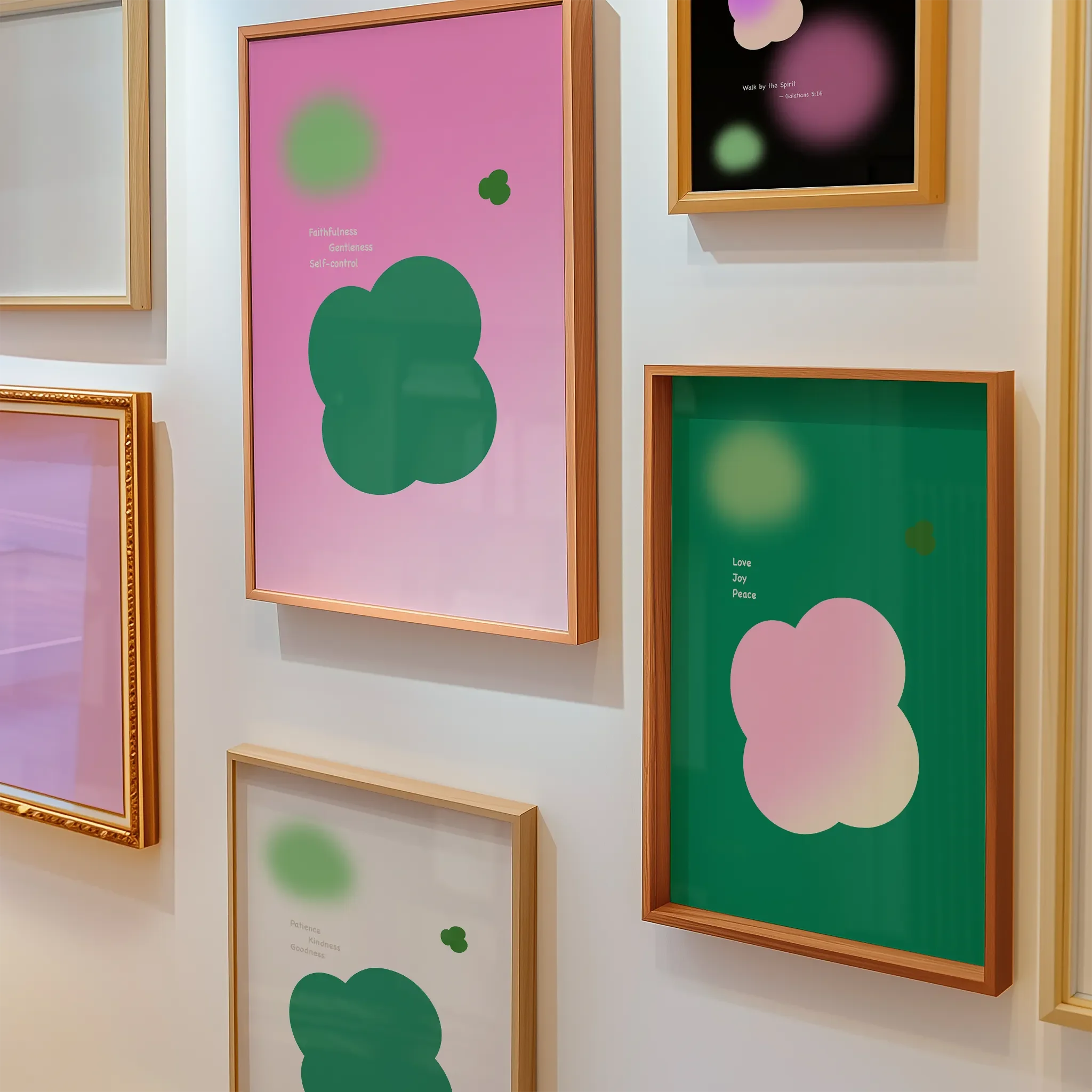Fruit of the Spirit Collection gallery wall with warm-toned frames in multiple sizes, creating a cohesive and inviting display.