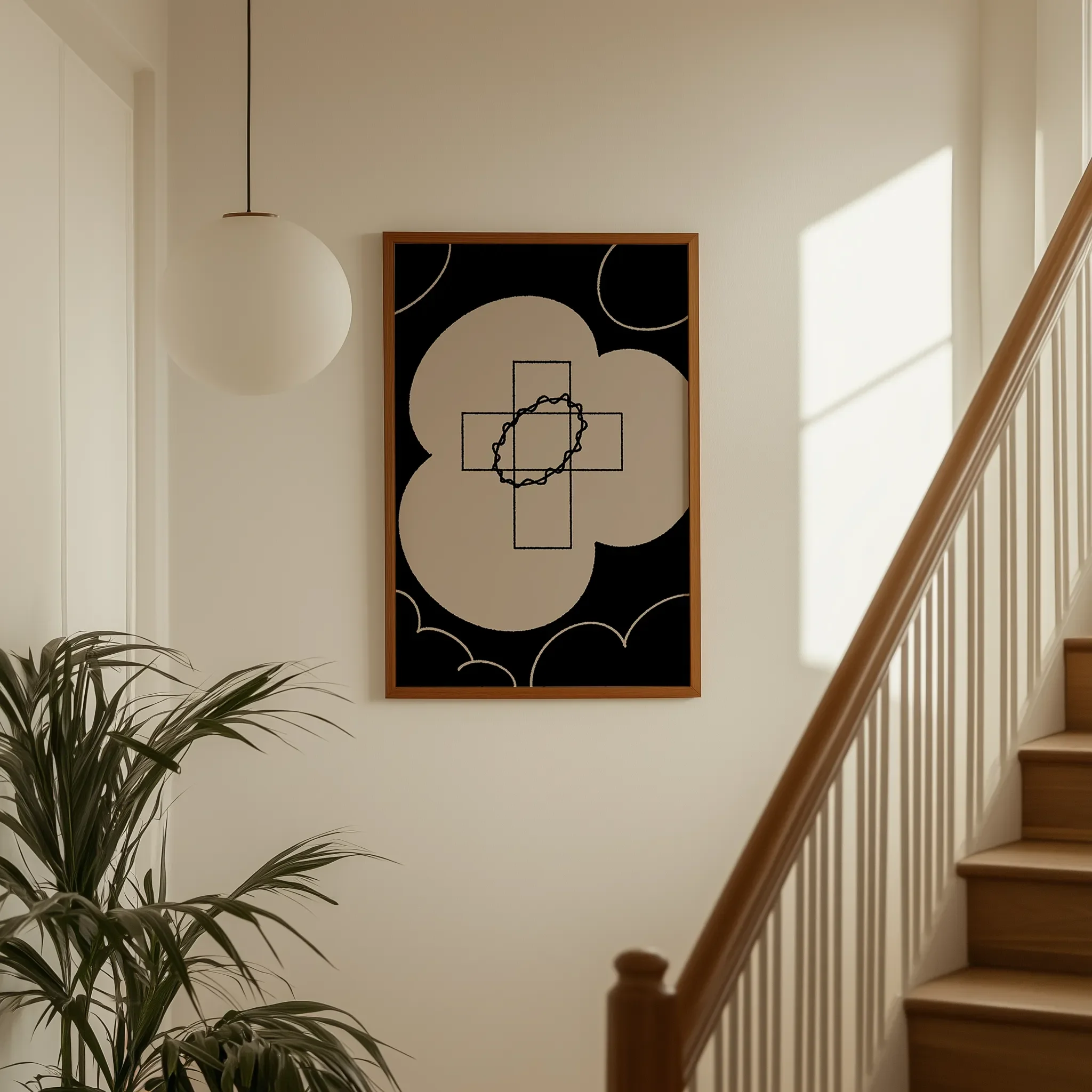 Displayed on a hallway wall near a staircase with directional natural light.