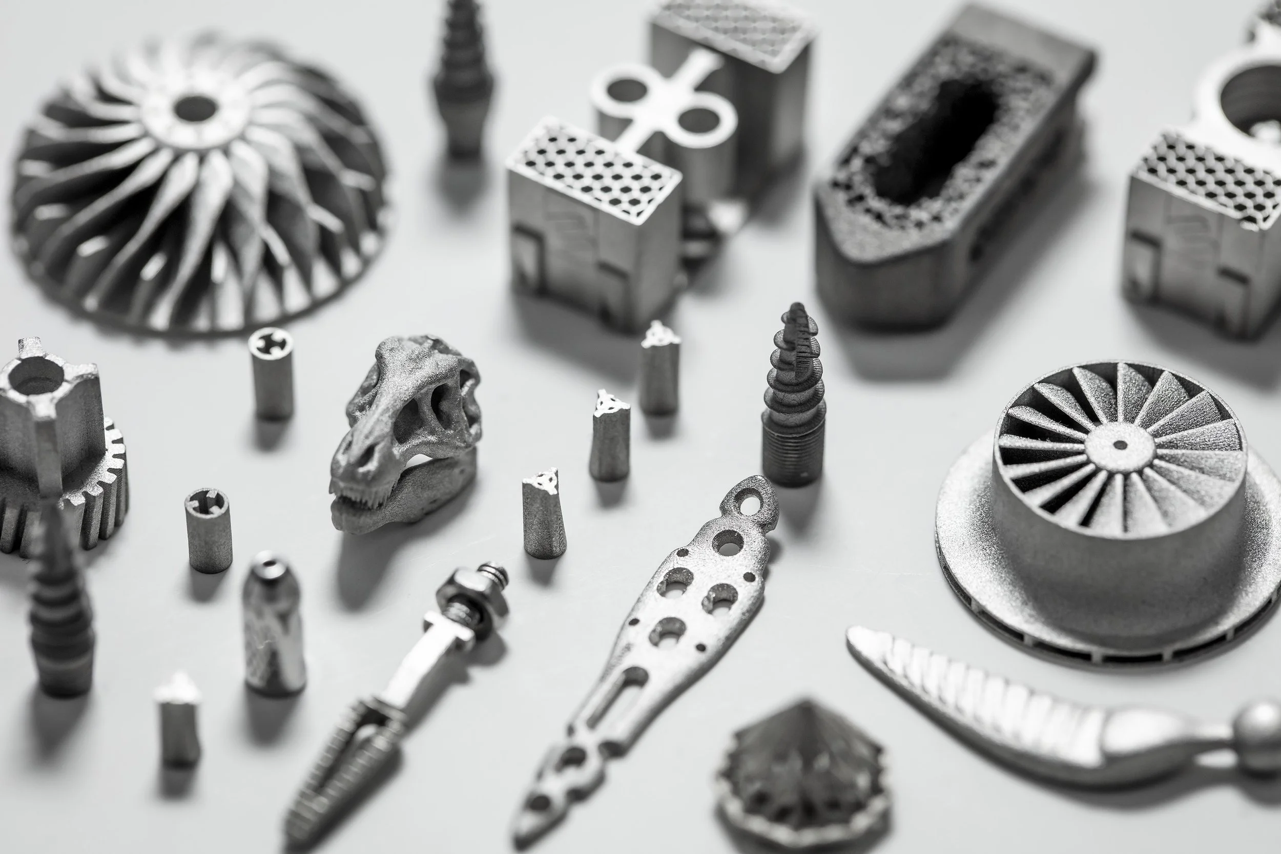 Various small, micro, high-accuracy metal parts 3D printed with lithography-based metal manufacturing.