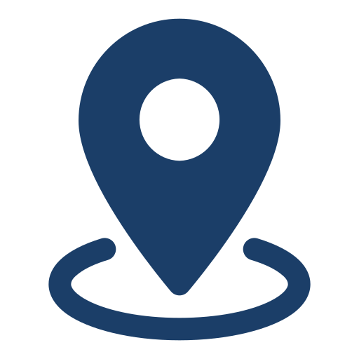 Icon of a map pin location marker with a globe around it.