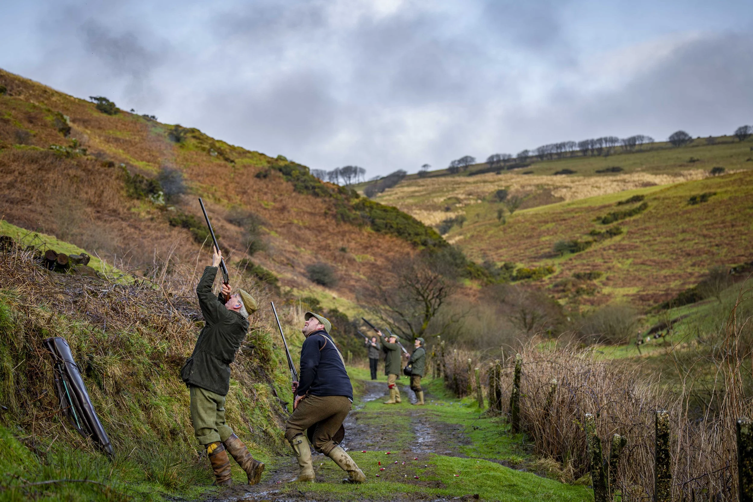 A line of guns positioned in a rugged Exmoor valley during a drive at Challacombe.