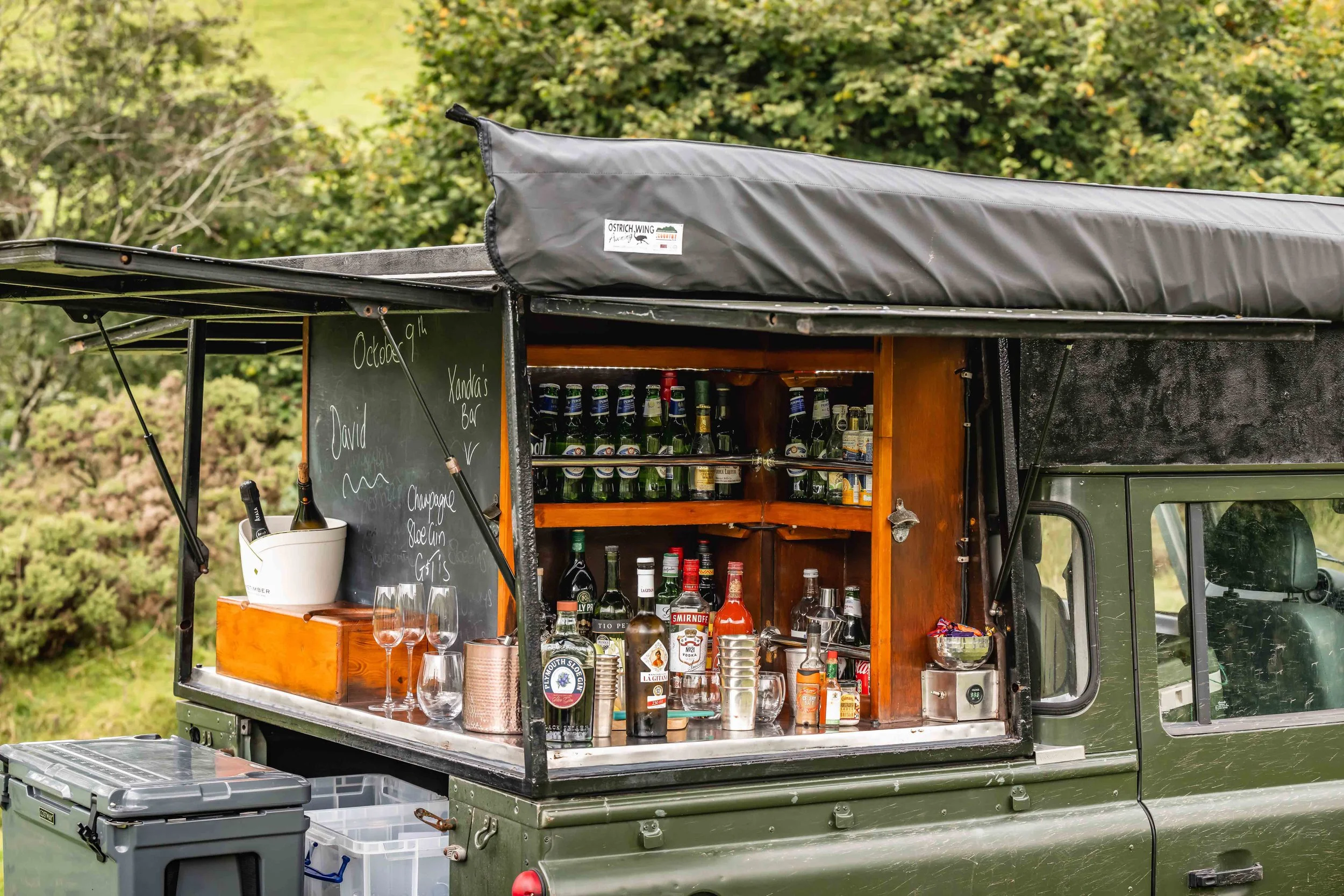 Close-up of the Loyton Land Rover equipped with stocked refreshment bar.