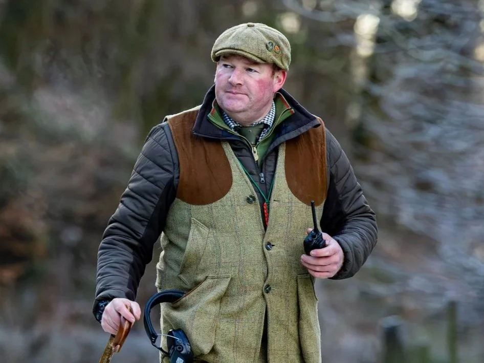 Nick Porter walking through woodland in the Loyton estate.
