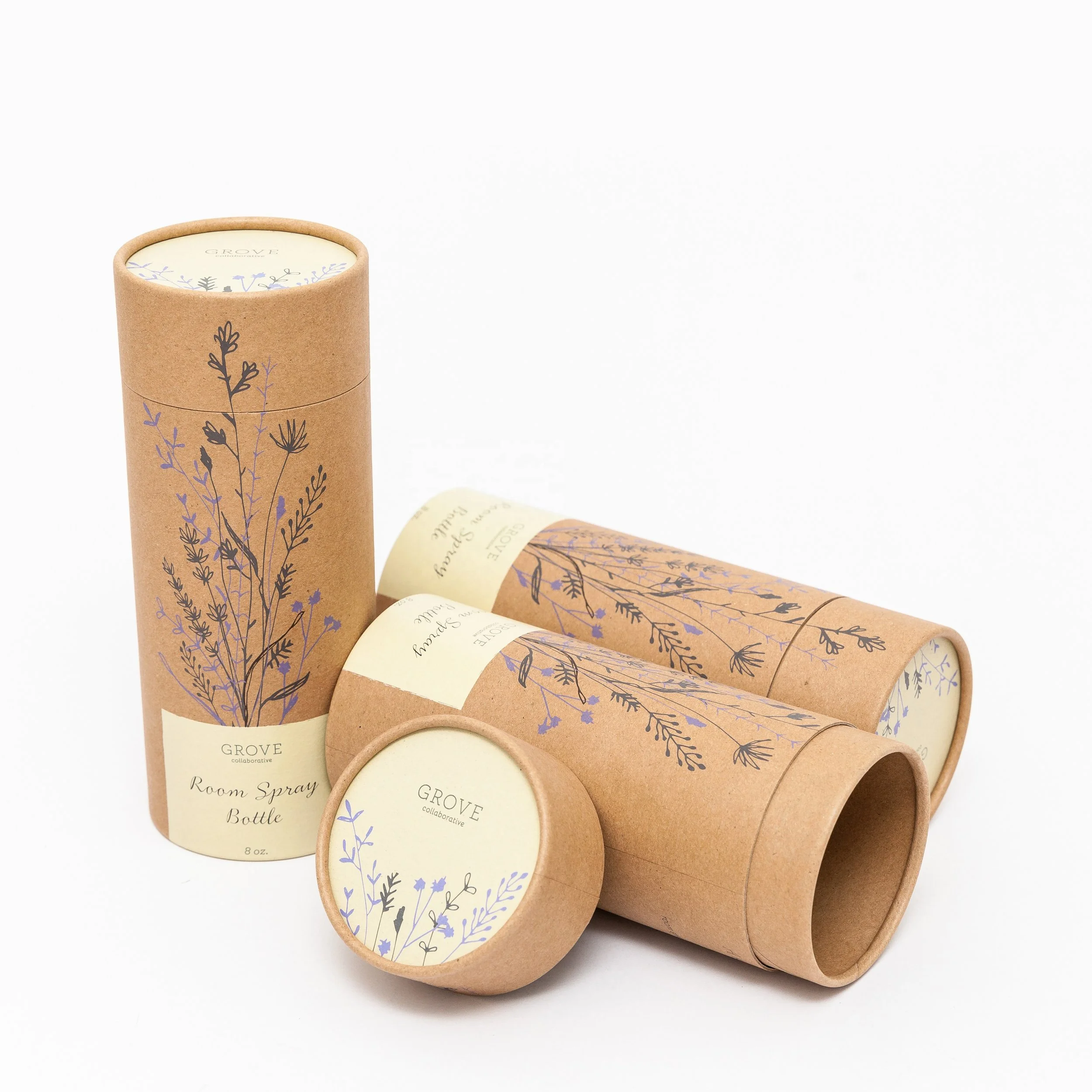 Brown kraft luxury tube with botanical print shown in three stages, perfect for eco-friendly beauty packaging.