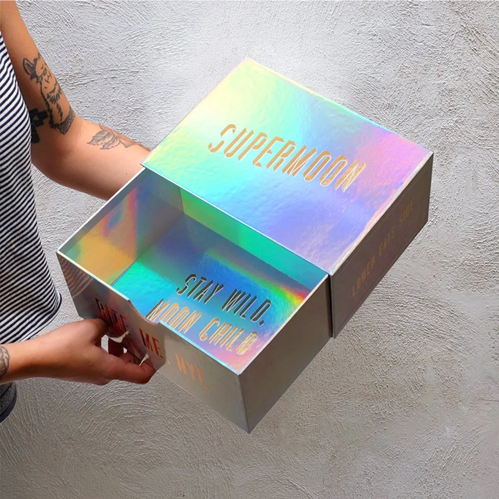 Holographic rigid luxury box with drawer open, ideal for luxury product packaging.