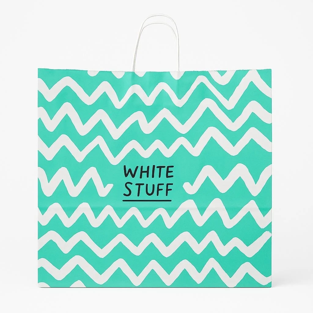 Turquoise custom printed paper bag with twisted handles and white logo, ideal for retail packaging.