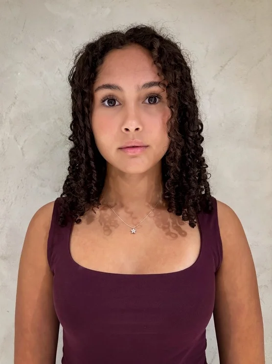 gotland pictures film casting - young teenaged girl with brown eyed and brown curly hair.