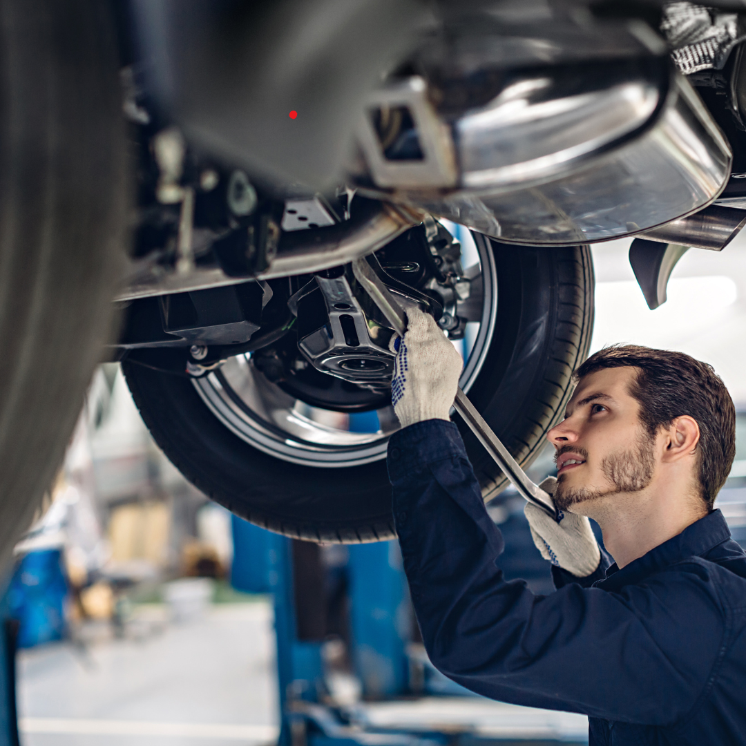 Repairush technician performing comprehensive 4x4 service and diagnostics on a Land Cruiser/Patrol, specializing in suspension and drivetrain repair in Dubai.