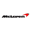 Certified McLaren specialist performing diagnostics and high-performance repair on a supercar at a luxury British garage in Dubai.