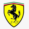 Certified Ferrari specialist performing high-performance service and diagnostics on a supercar at a luxury Italian car garage in Dubai.