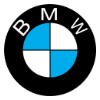 Certified BMW specialist performing diagnostics on a 5-Series or X5 at the Repairush German car garage in Dubai.