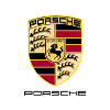 Certified Porsche 911 specialist performing luxury car service and detailing at a German car garage in Dubai.