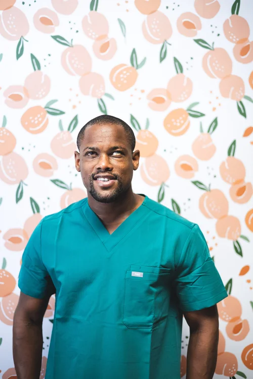 DJ — licensed massage and bodywork therapist at Just Peachy