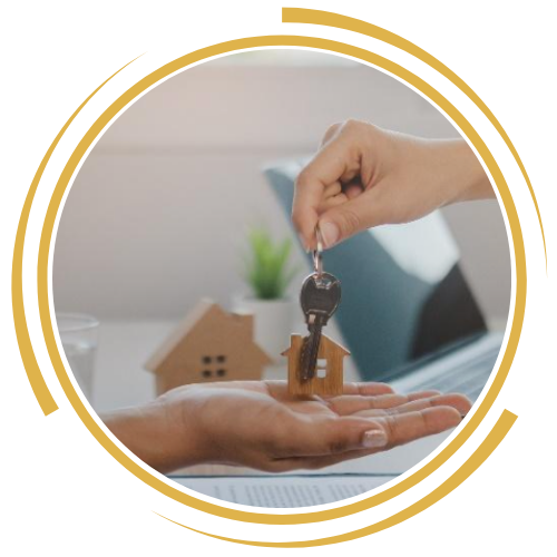 Keys to a new home being handed over to a family