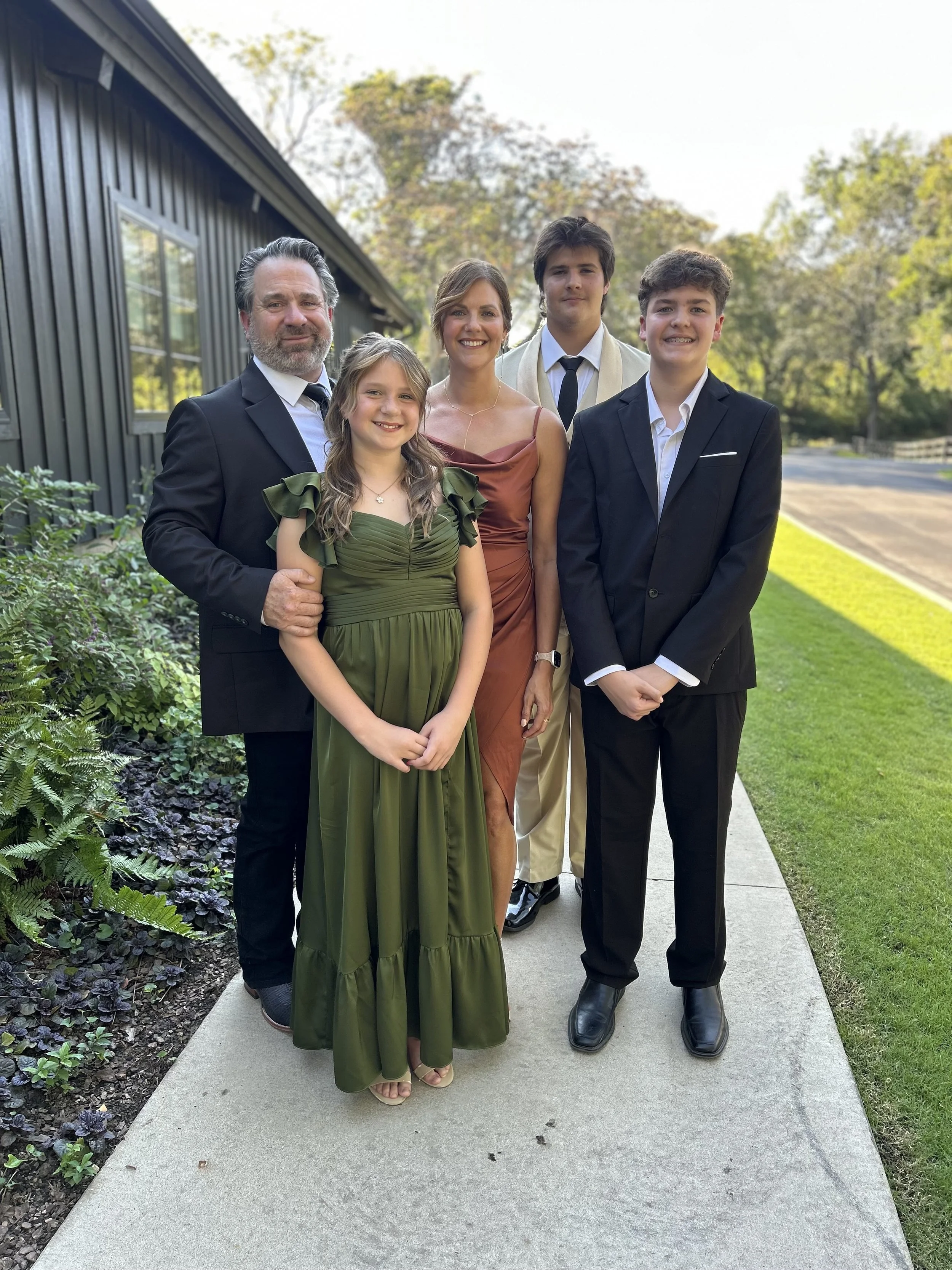 Miller Roof & Exteriors family team standing together in Tulsa, Oklahoma