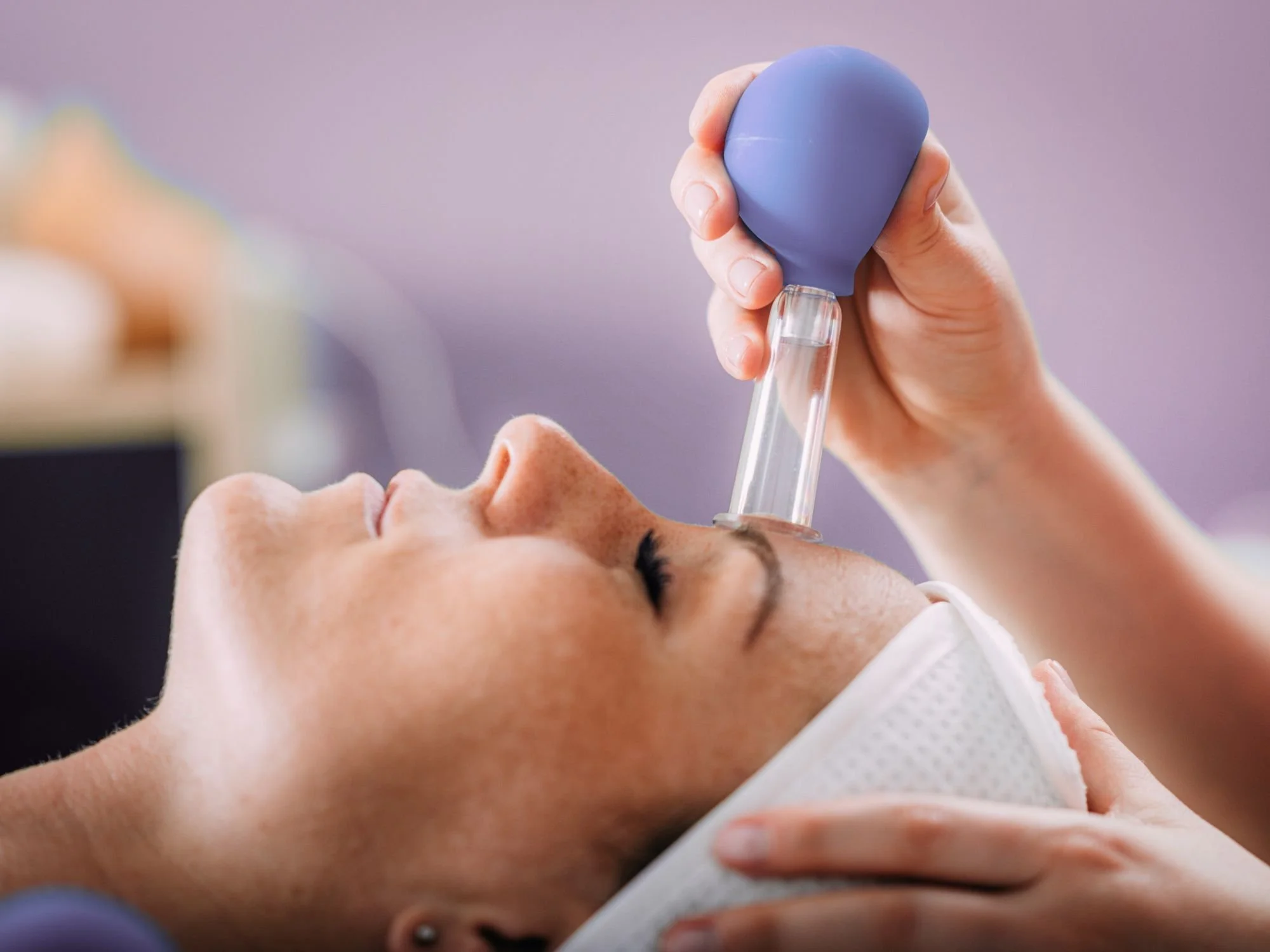 Silicone cups used on neck and shoulder muscles to release tension