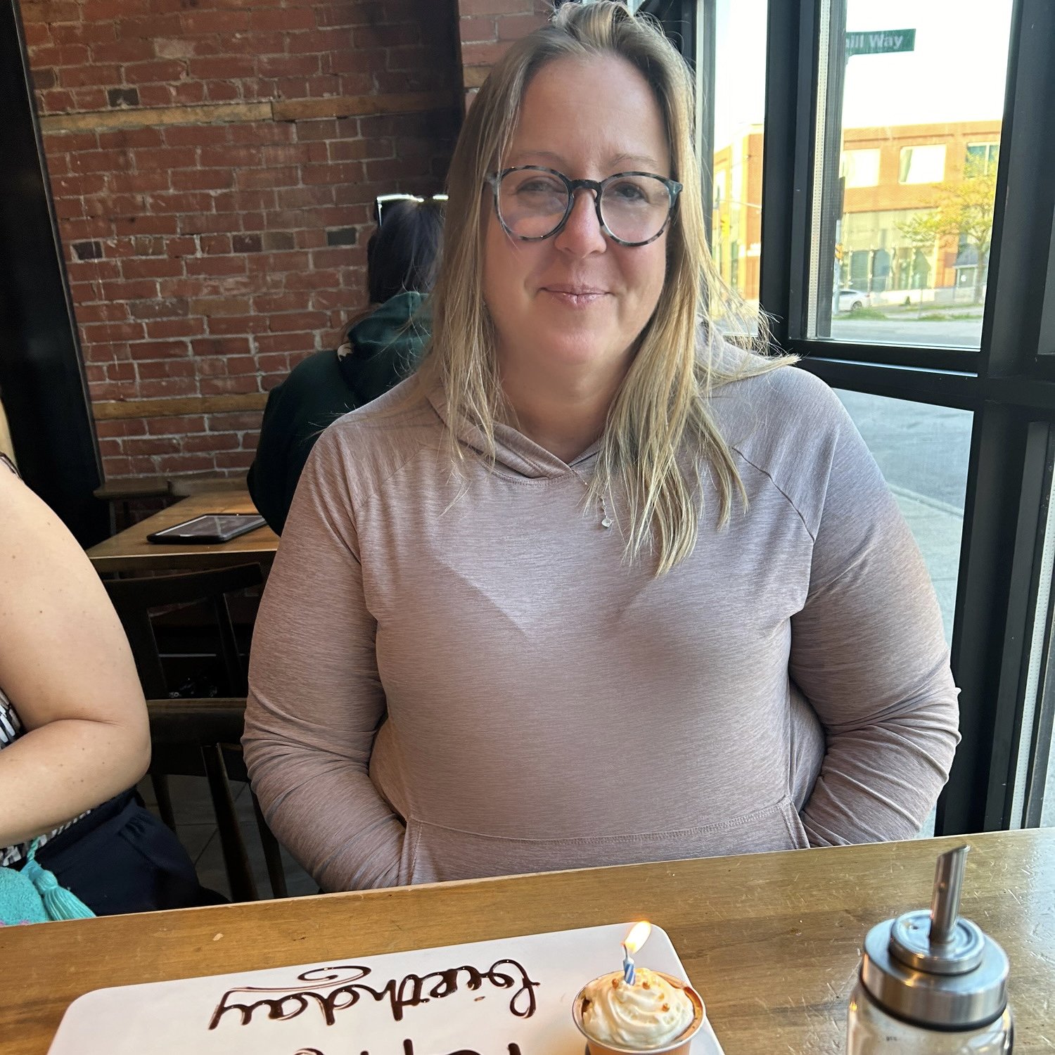 image of a woman smiling on her birthday