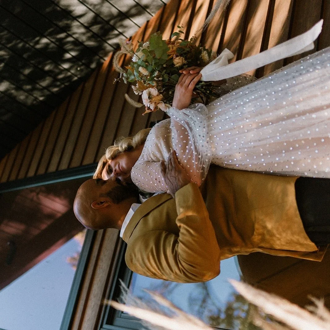 Bride and groom snuggling after their ceremony at their intimate micro-wedding in Dorchester, NJ