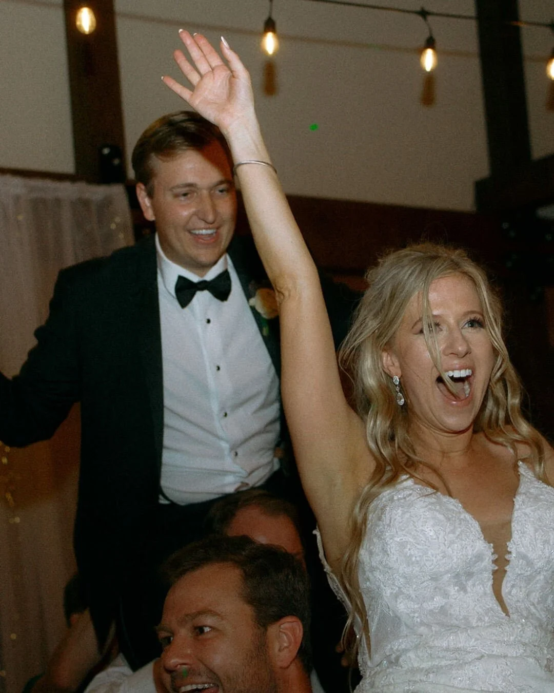 Candid bride and groom dancing at Chicago suburbs wedding reception, documentary wedding photography by Nicole Kilday