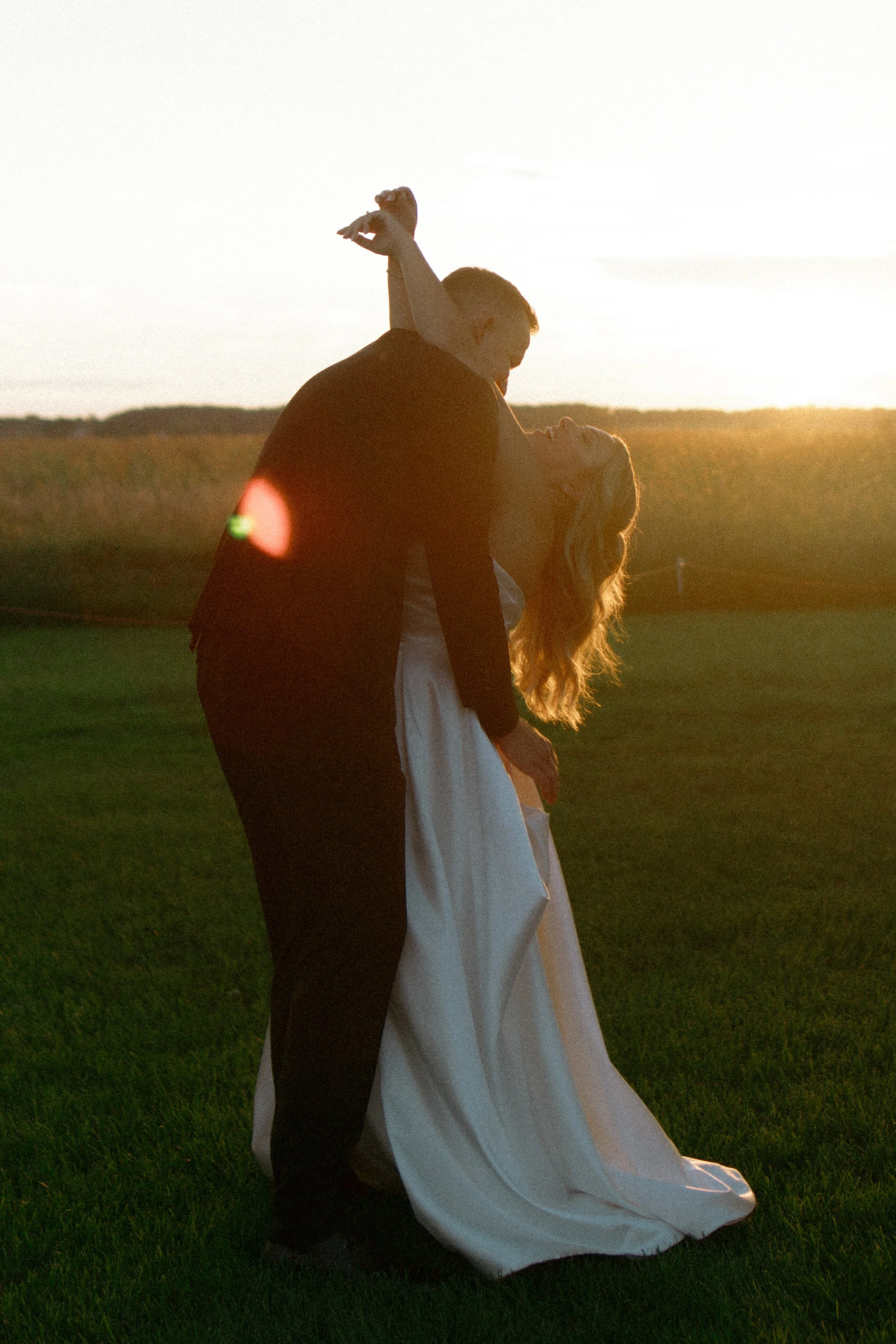 Bride and groom sunset portraits at Bluestem Farm in Hebron Illinois, Northern Illinois wedding photographer Nicole Kilday