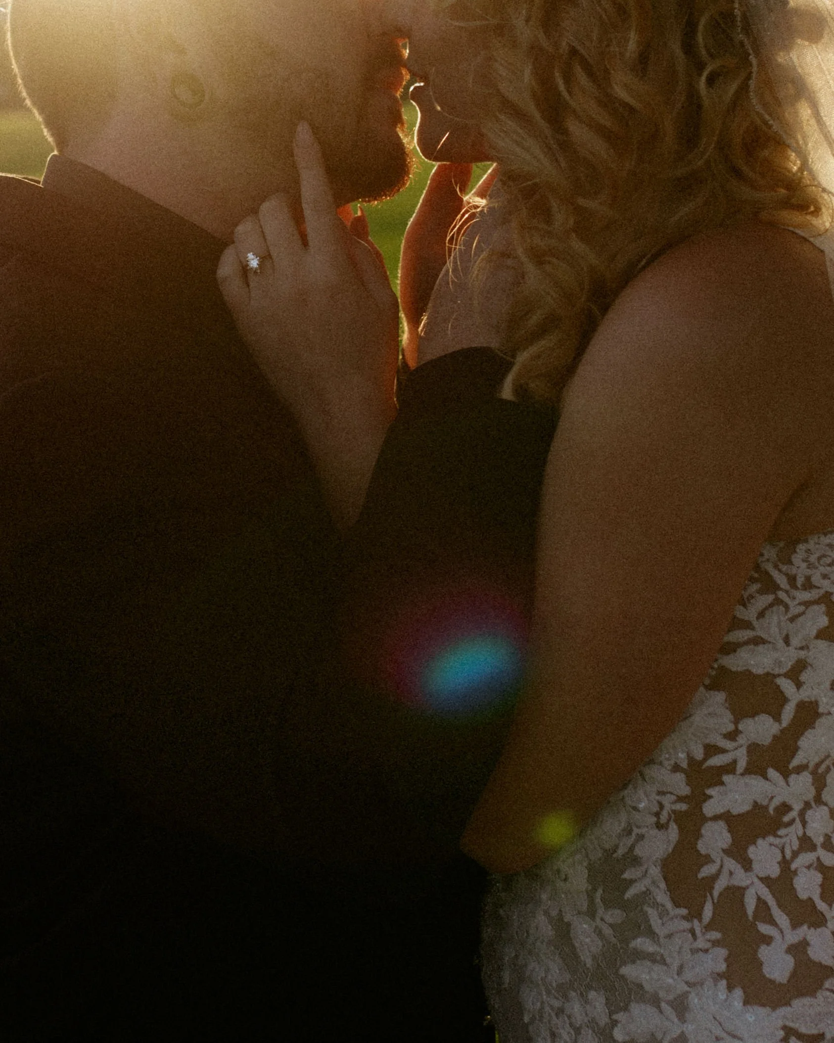 Close up of couple on their wedding day kissing in the sunset in McHenry County Illinois by Nicole Kilday