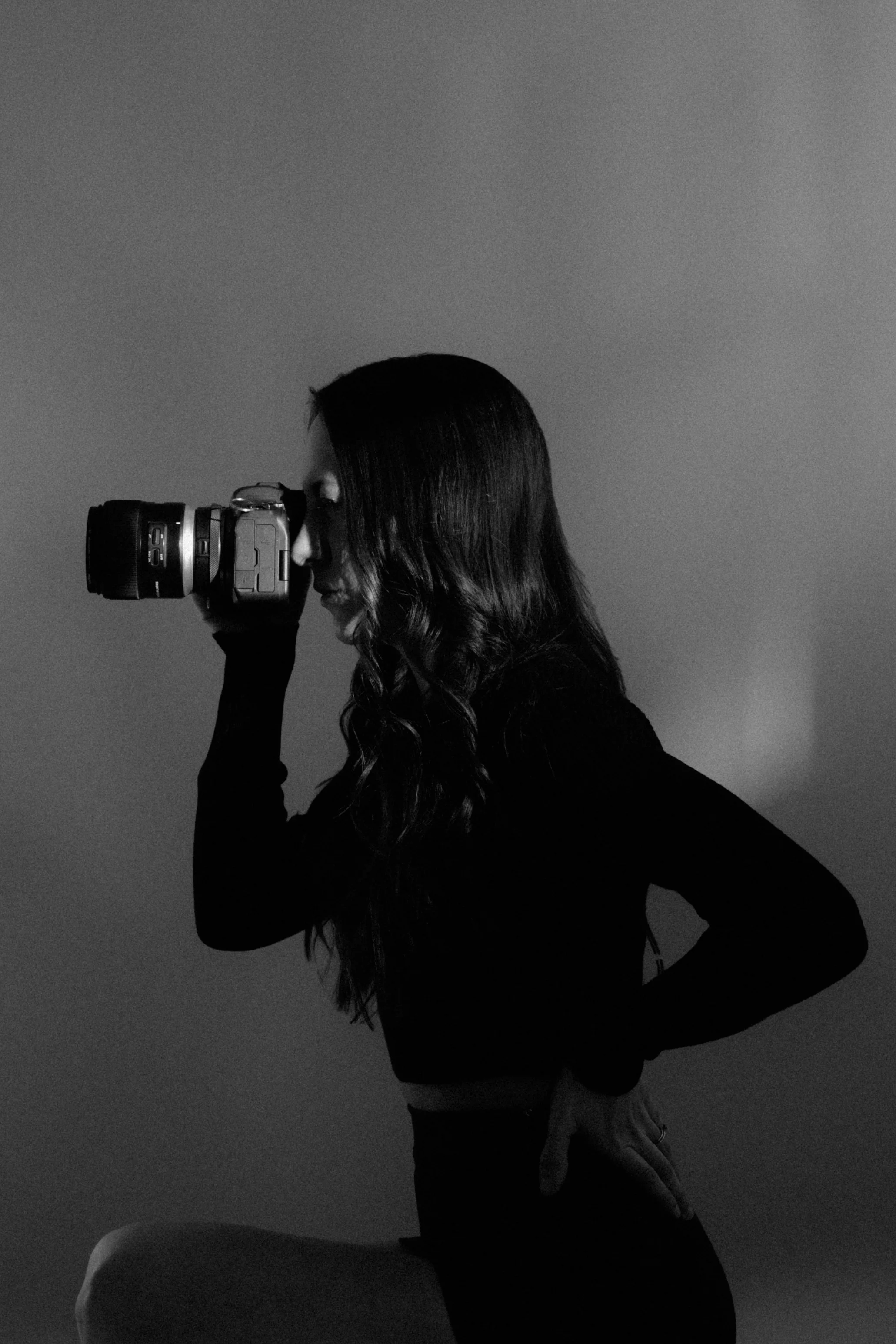 Nicole Kilday, Illinois wedding photographer, holding her camera — creator of the SEO and AI Visibility Framework for wedding photographers