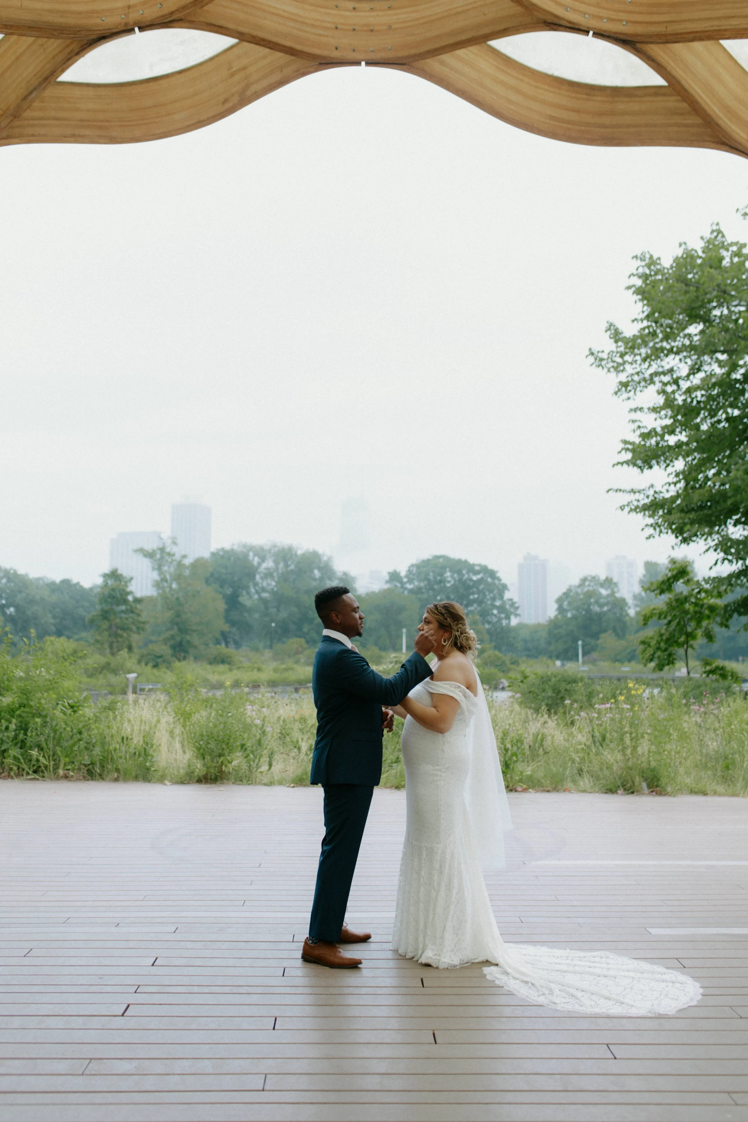 Couple crying happy tears during their vows in Chicago, IL at their elopement in Lincoln Park