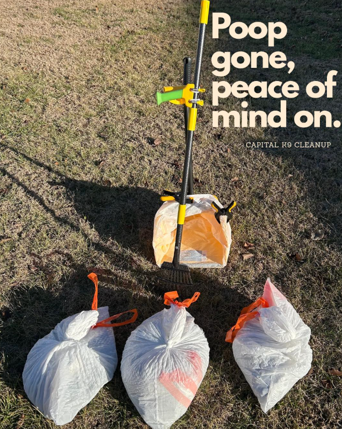 A grassy area with a trash picker, garbage bag, and three tied garbage bags, along with text that reads 'Poop gone, peace of mind on. Capital K9 Cleanup.'