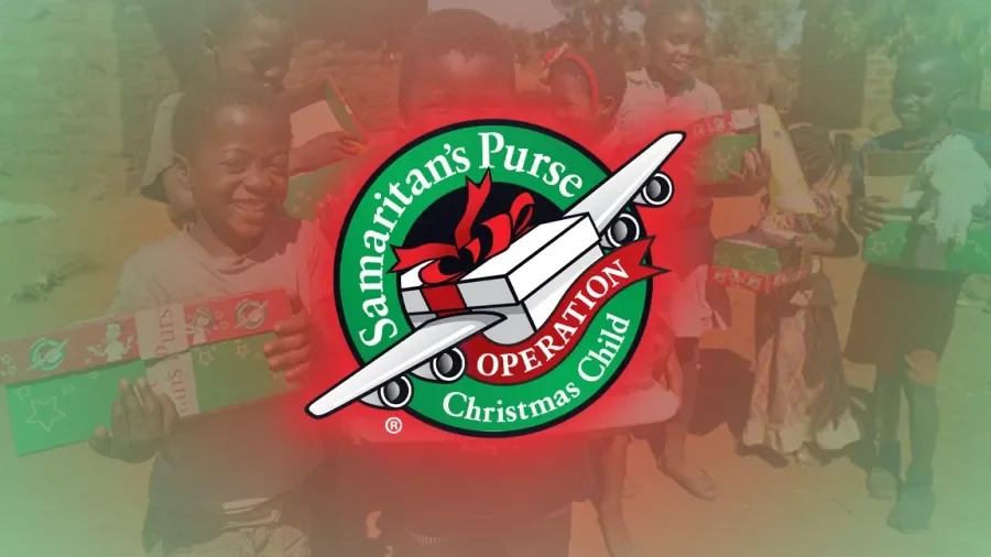 Children holding Christmas gifts with a Samaitan's Purse Operation Christmas Child logo in the center.