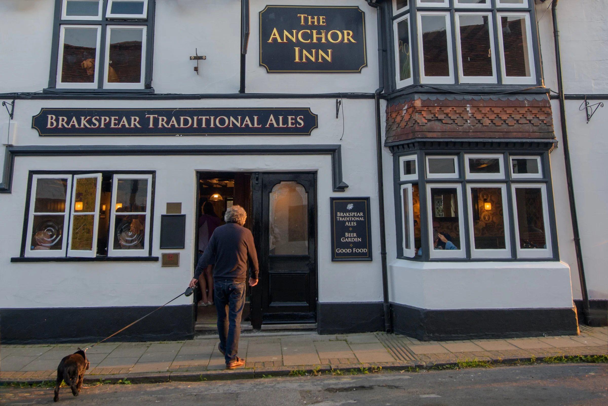 The exterior of The Anchor Inn pub with Brakspear signage, a traditional venue offering seasonal dishes