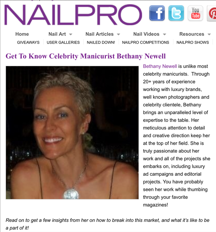 A website page titled 'Get To Know Celebrity Manicurist Bethany Newell,' featuring a close-up photo of Bethany Newell with short, gray hair, wearing a necklace with a large pendant, and smiling, set against a dark, blurred background.