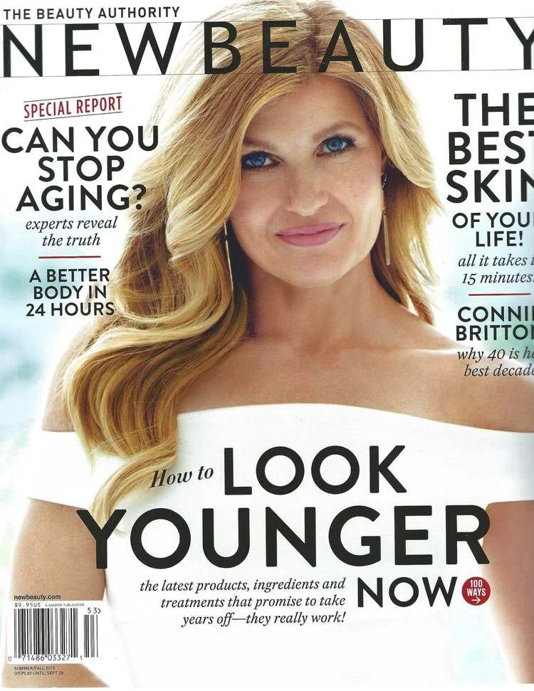 Cover of New Beauty magazine featuring a woman with long blonde hair and blue eyes, smiling slightly. Headlines include topics like anti-aging, skincare, and beauty treatments.