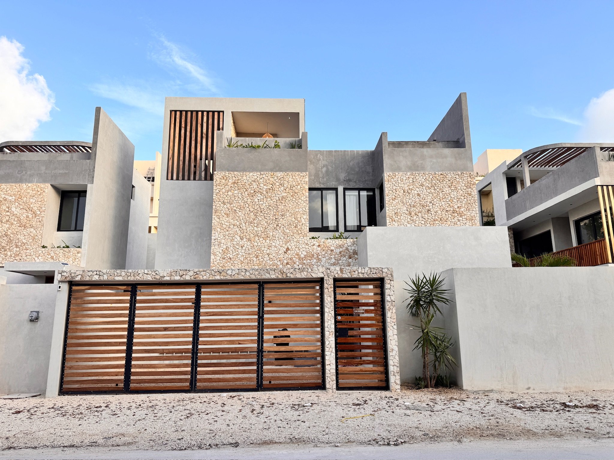 Villa ANIANA Tulum luxury vacation rental with modern organic architecture, private pools, rooftop, terrace, and serene jungle setting in La Veleta bear Aldea Zama and Tulum Beaches