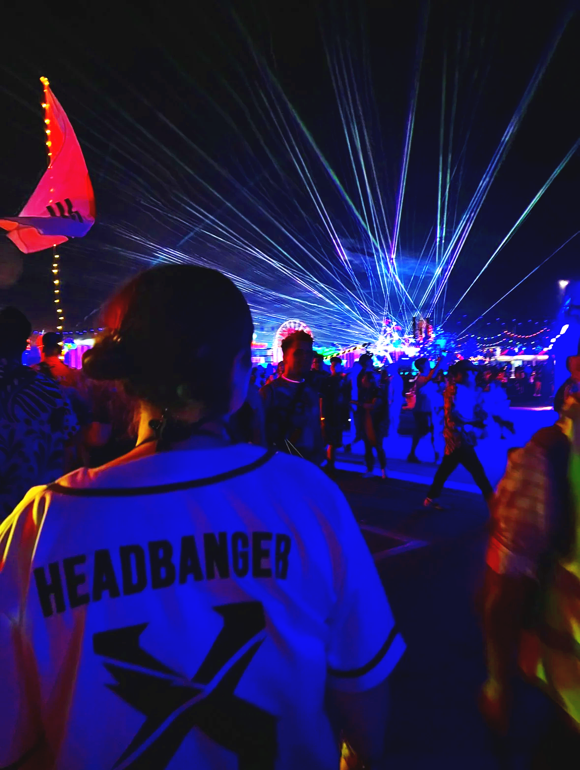 Therapist enjoying lasers at EDM festival