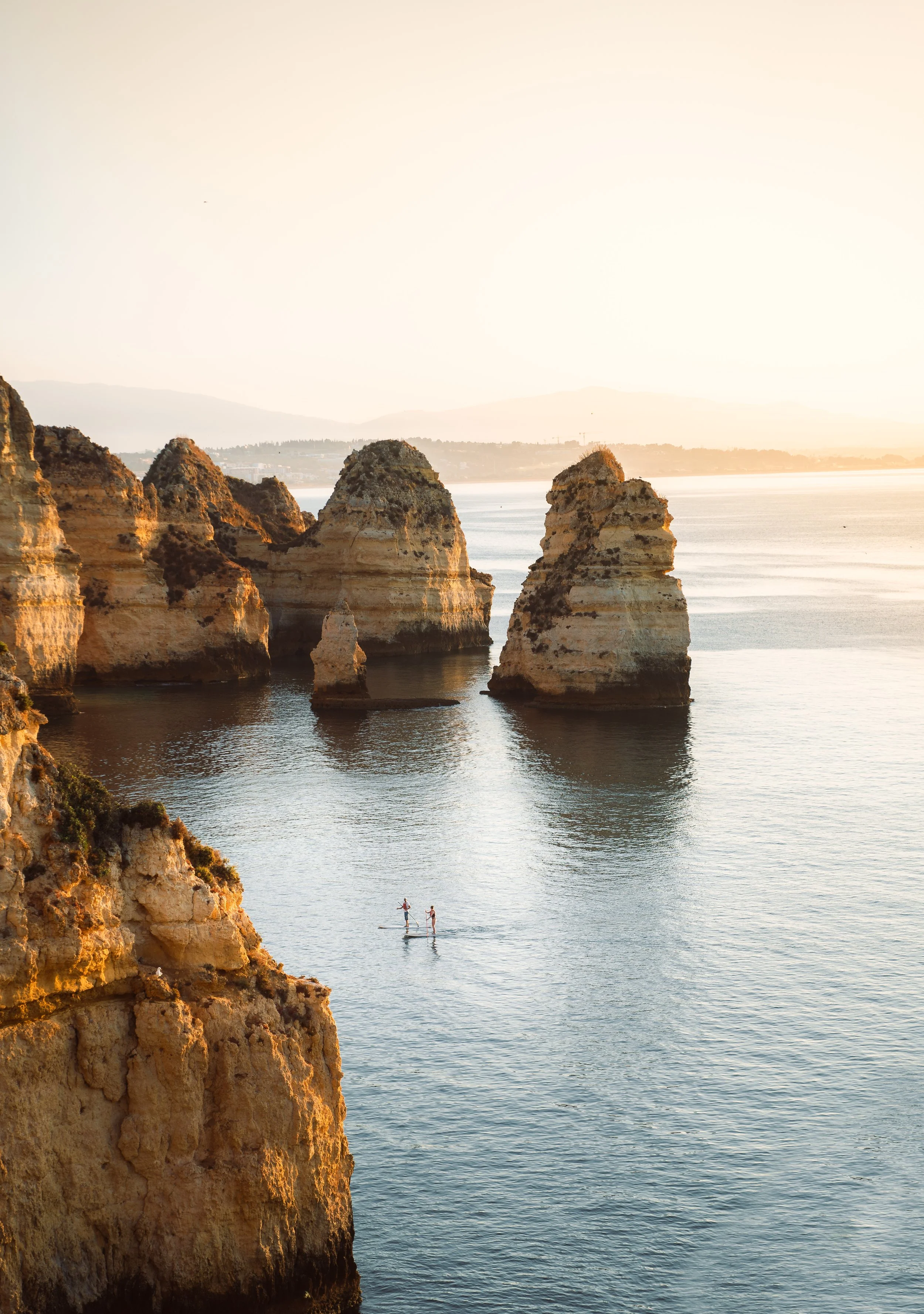 sunrise-view-of-ponta-da-piedade-with-stand-up-pad-2025-03-09-05-44-34-utc.jpg
