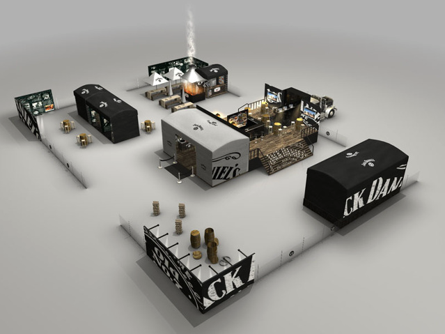 A bird's-eye view of an exhibition booth setup with various enclosed sections, display areas, seating, aged barrels, and signage.