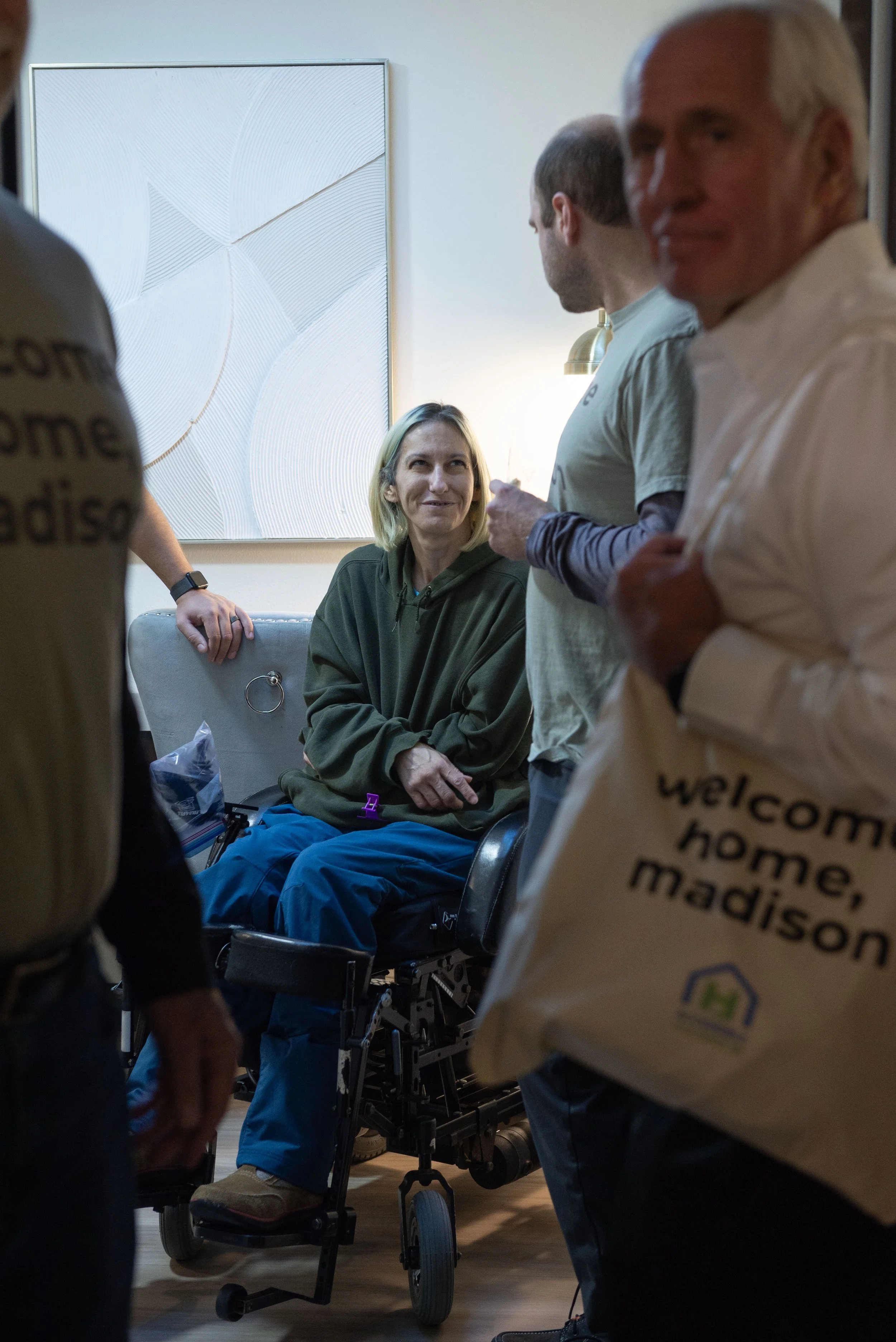 Mingling inside the warm and sunny ADU after the ribbon cutting 