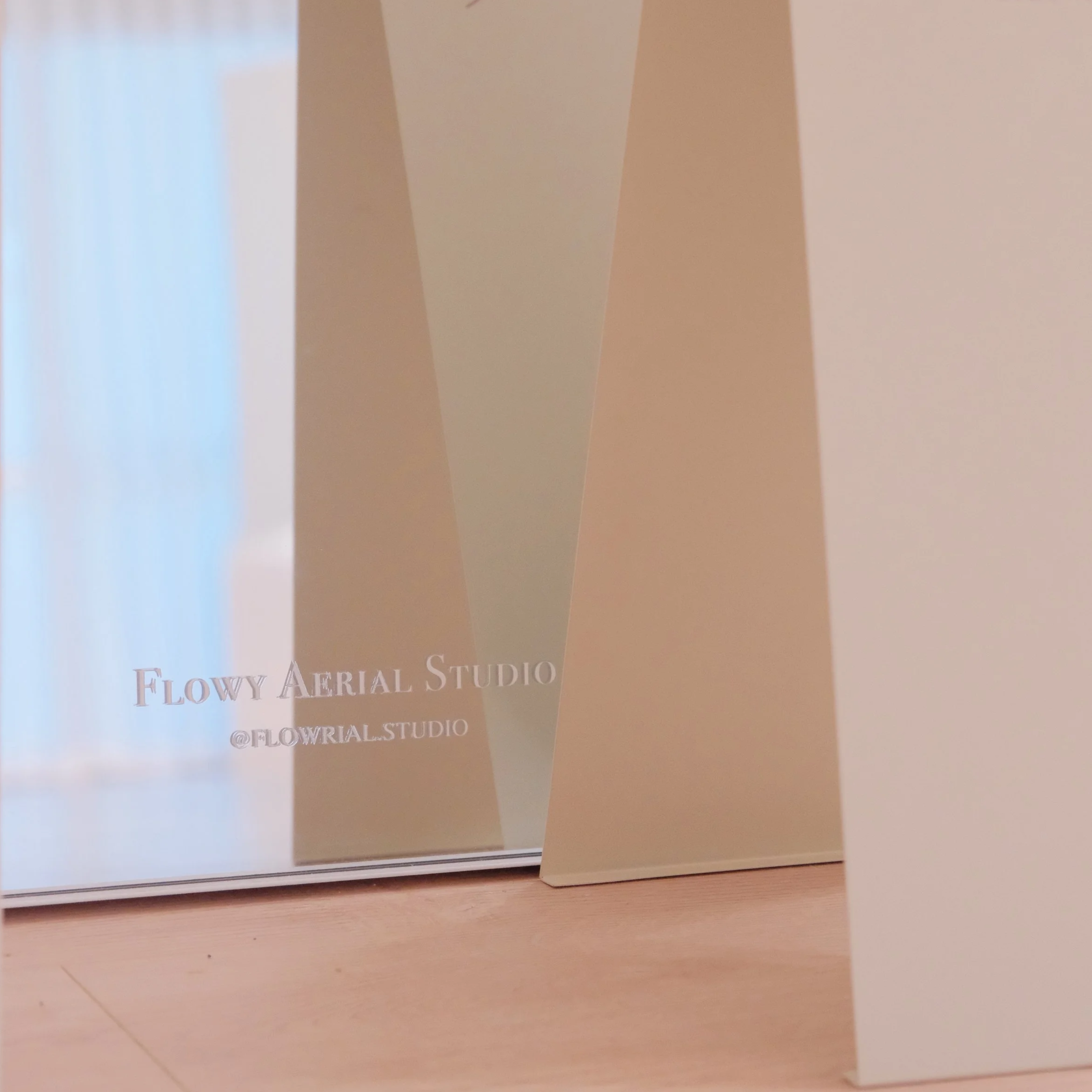 Clean and cozy aerial studio in Melbourne CBD with hoop and hammock setup for flow and training.