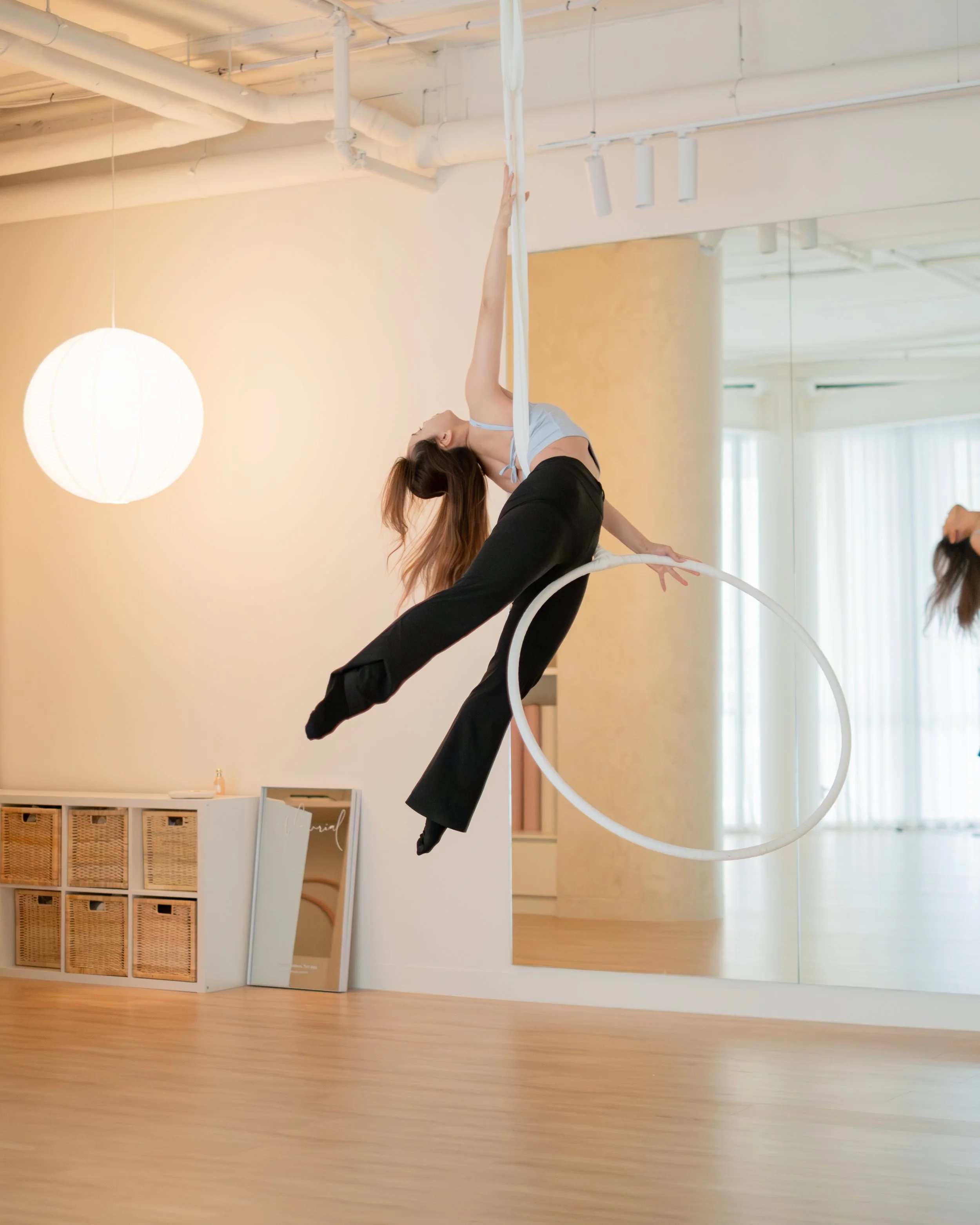 Aerial hoop training space in Melbourne CBD, clean and minimal studio.