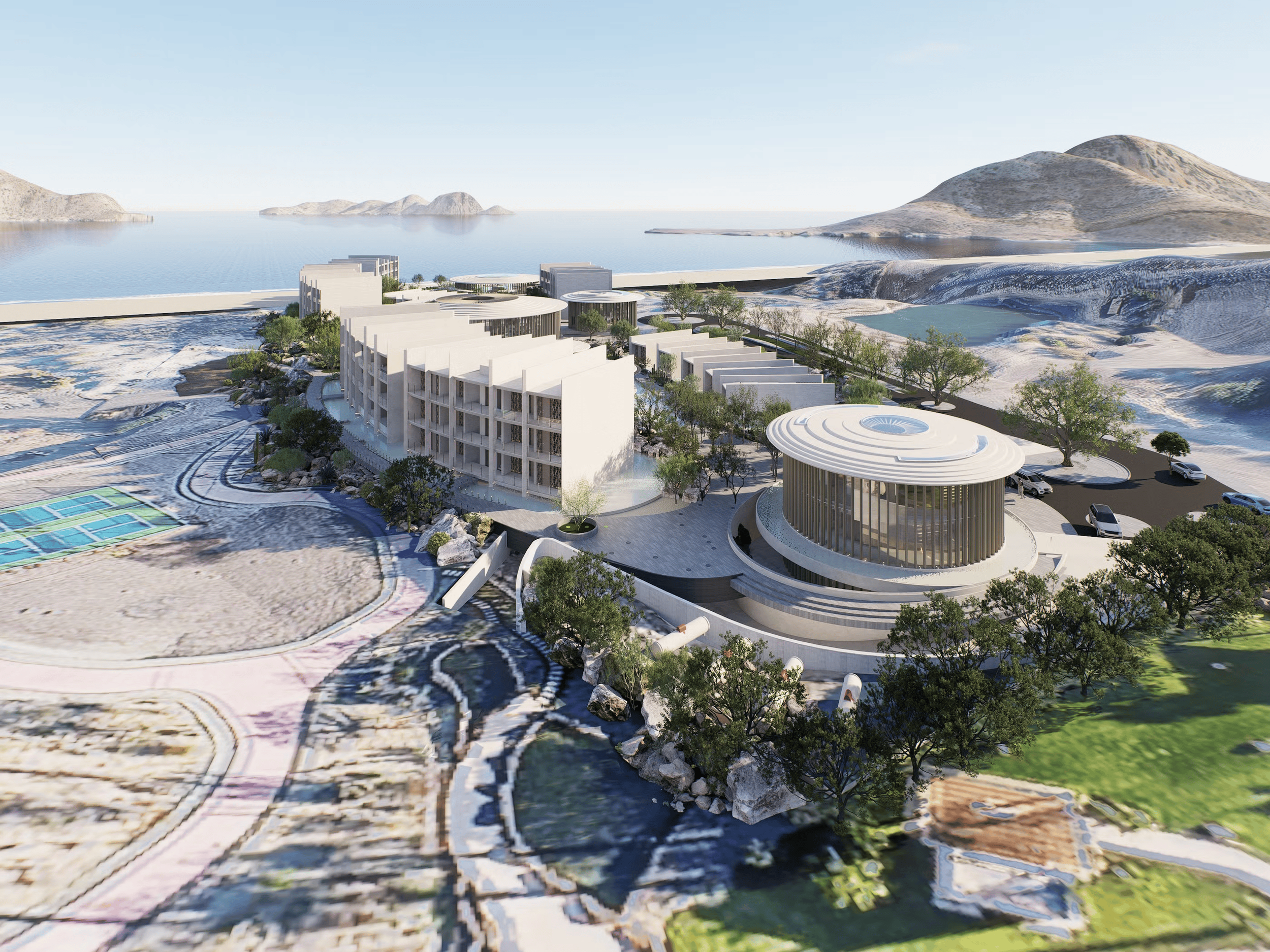 Aesthetic modern architectural complex with curved buildings near water, surrounded by greenery and mountains, featuring parking and recreational areas.